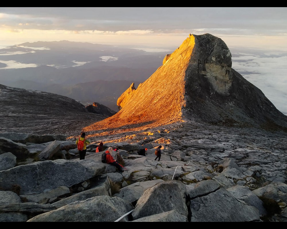 Climbers approaching Low's Peak on Mount Kinabalu