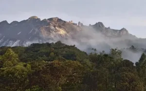 Mount Kinabalu above Sabah rainforest