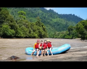 White-water rafting group beside the Kiulu River