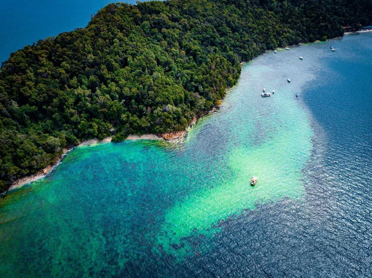 Aerial view of a secluded tropical island beach
